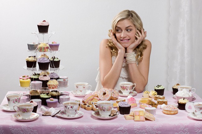Woman with table of tea and cakes Image downloaded by John O'Reilly at 12:26 on the 15/06/11